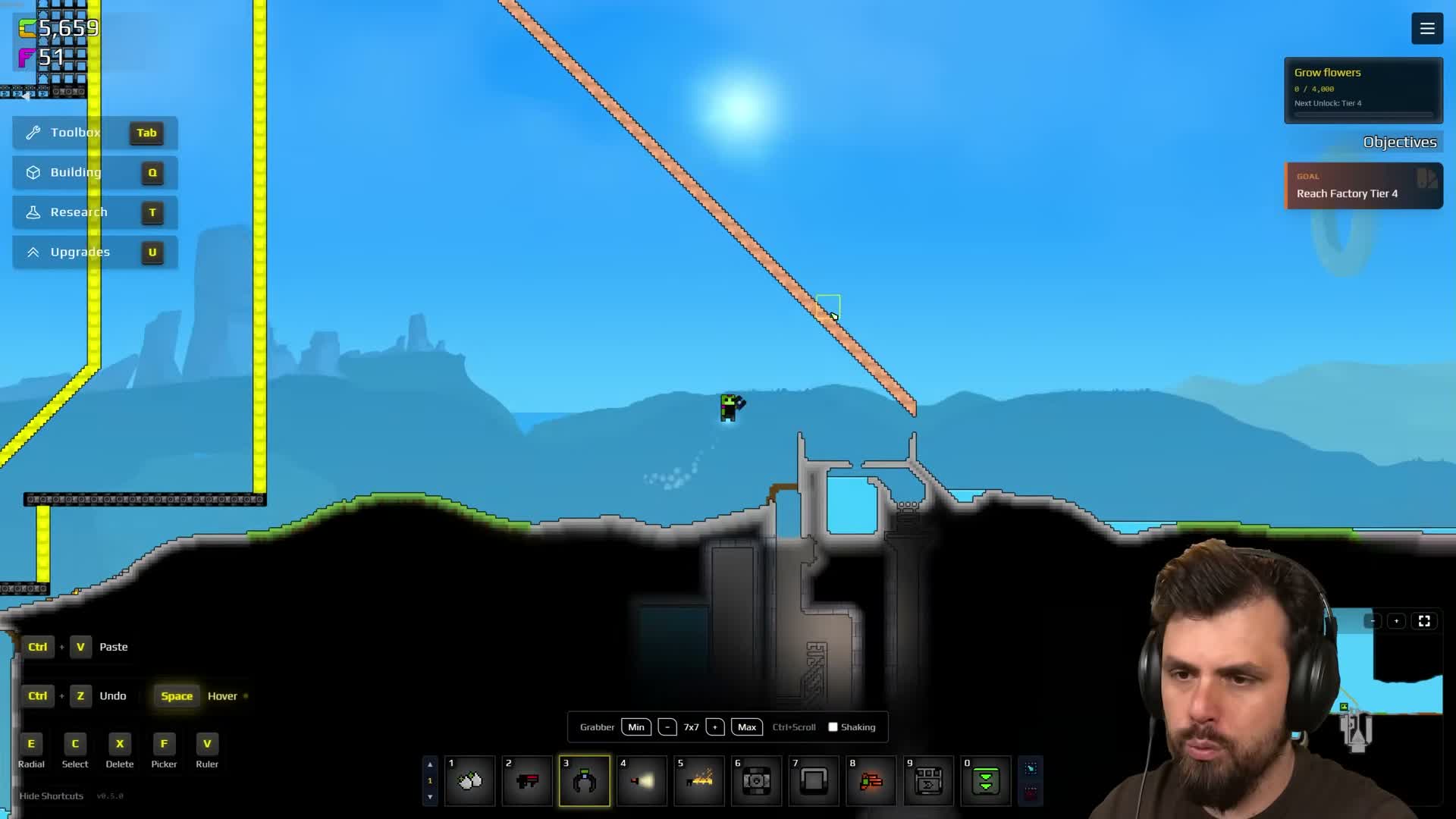 A large triangular structure in a Sandustry community gameplay recording